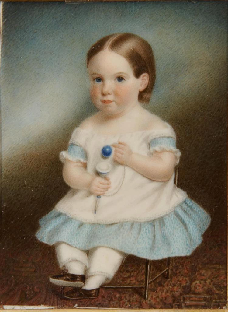 Ritratto di George Albert Hunnewell da bambino seduto con in mano un giocattolo